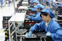 נגד תנאי העבודה המחפירים של מפעלי אפל בסין