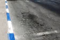ביטול צביעת כחול לבן ברחובות מרוחקים מהעיר (חדרה)